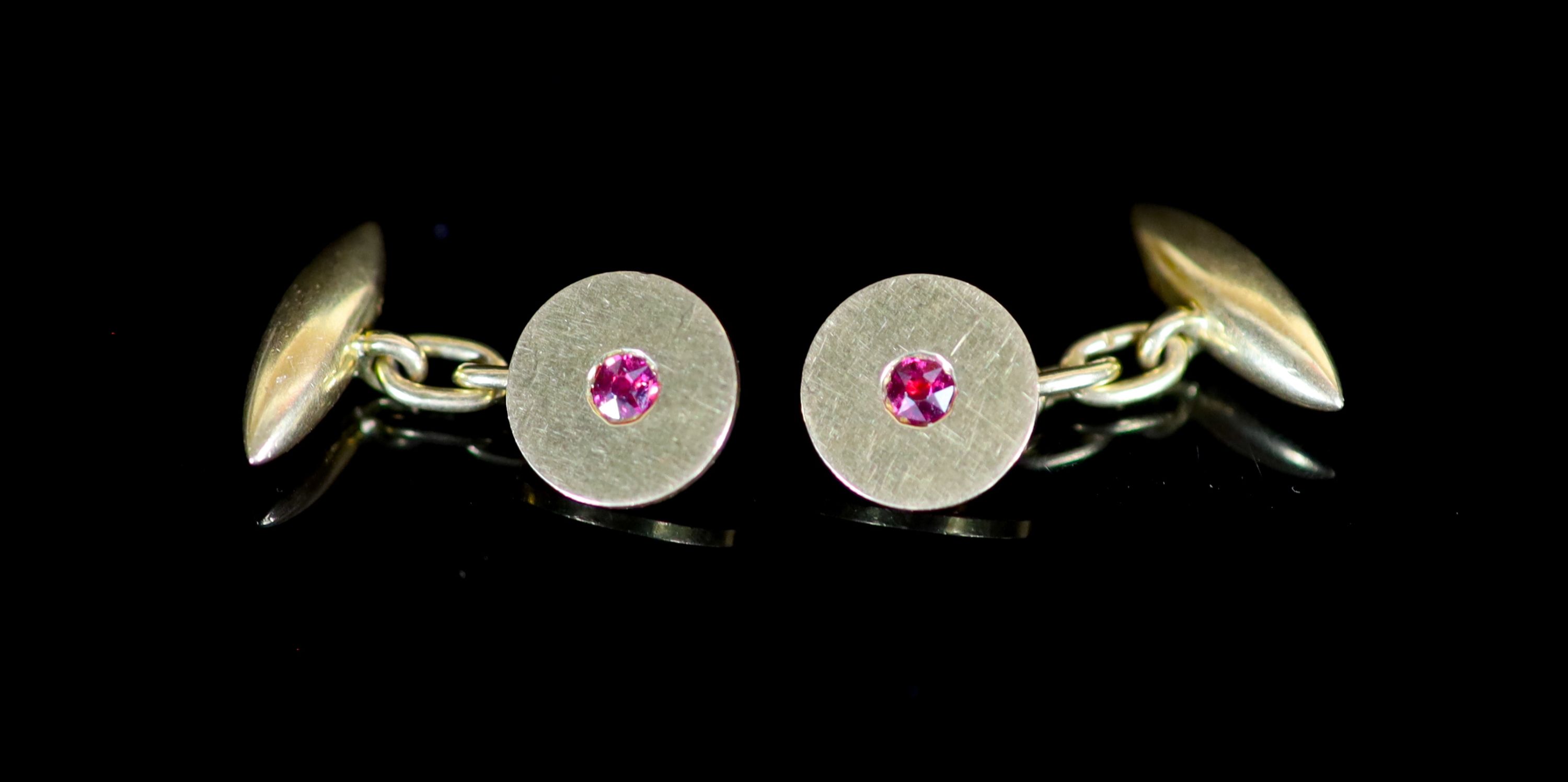 A pair of 18ct gold and ruby set disc cufflinks